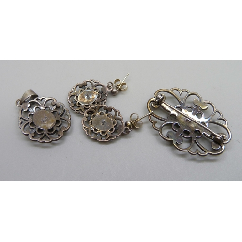 998 - A silver and synthetic opal jewellery set - a brooch, a pair of earrings and a pendant, 13g