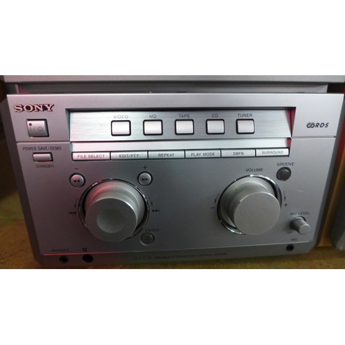 5105 - A Sony mini hi fi component system including HTL-NXL stereo cassette/CD player, a Sony STR-NXL FM st... 