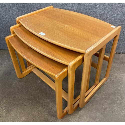 50 - A teak nest of tables