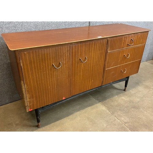 56 - A teak sideboard