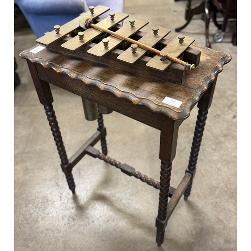 158 - An early 20th Century oak bobbin turned occasional/xylophone table