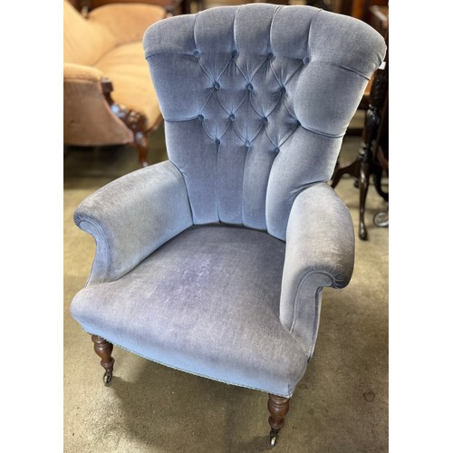 154 - A pair of Victorian carved oak and fabric upholstered tub chairs and a Victorian style armchair