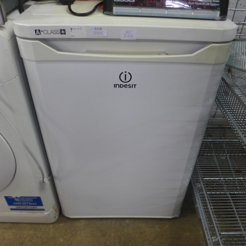 5119 - An Indesit TFAA10 free standing under counter fridge