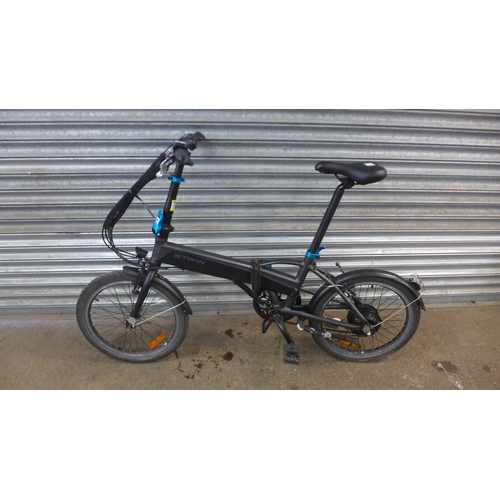 5137 - A BTwin electric assisted folding bike - no battery, key or charger