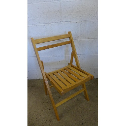 5180 - 4 teak folding garden chairs and 3 beach folding chairs