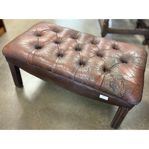 222 - A red leather Chesterfield footstool