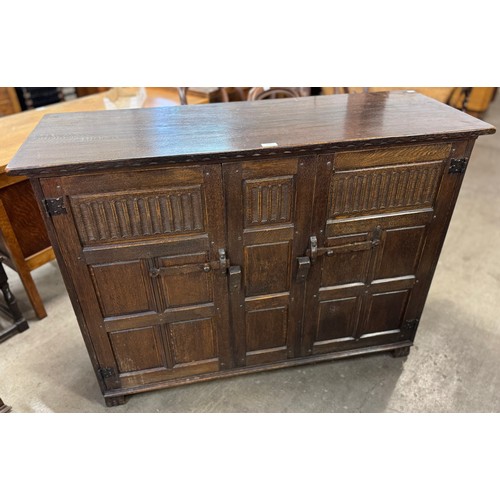 177 - A Nigel Griffiths carved oak sideboard