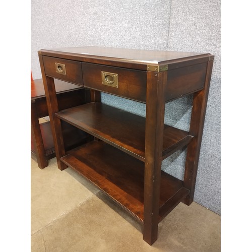 125 - A Campaign style mahogany console table and lamp table