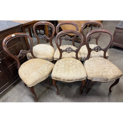 178 - A set of six Victorian carved mahogany balloon back dining chairs