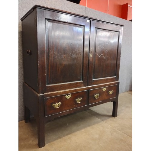 126 - A George III mahogany cupboard on stand