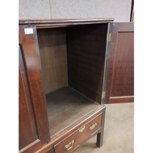 126 - A George III mahogany cupboard on stand