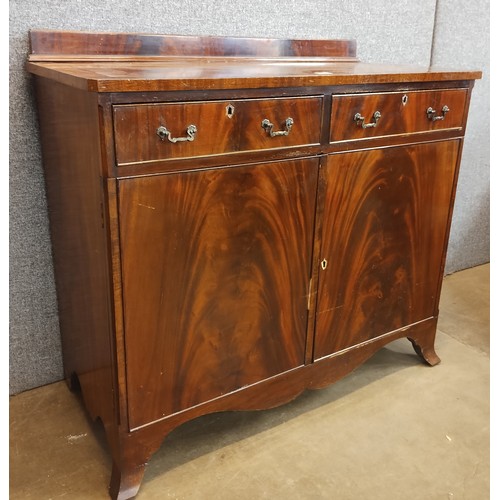 124 - A George III mahogany cupboard