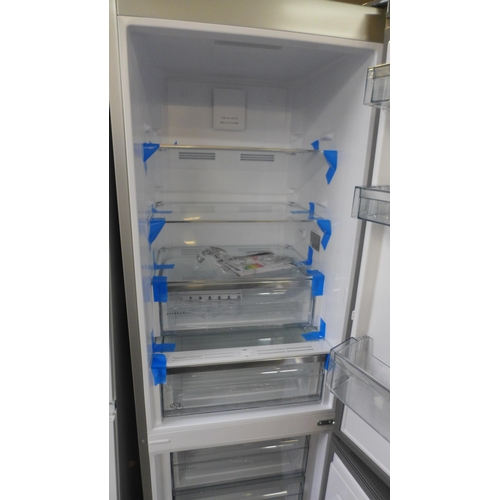 4179 - AEG Freestanding 60/40 Fridge Freezer (Frost Free)  (Transit damage dents to front) , Model No RCB63... 