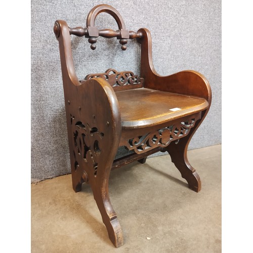 128 - An early Victorian carved mahogany hall chair, attributed to Richard Bridgens