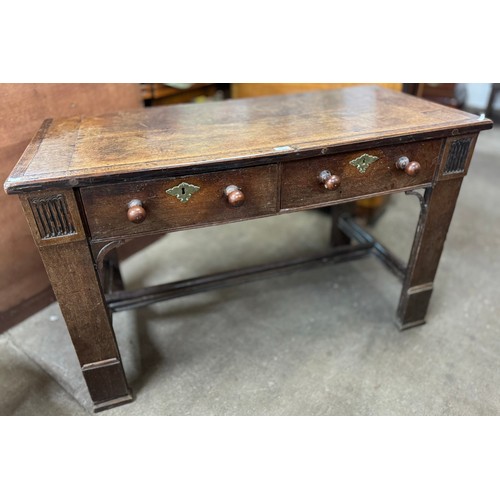 180 - A George III oak two drawer serving table