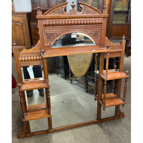 183 - An Edward VII carved oak overmantle mirror