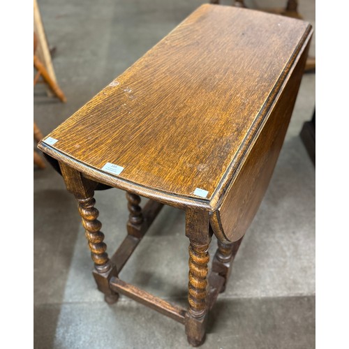 189 - An early 20th Century oak barleytwist gateleg table