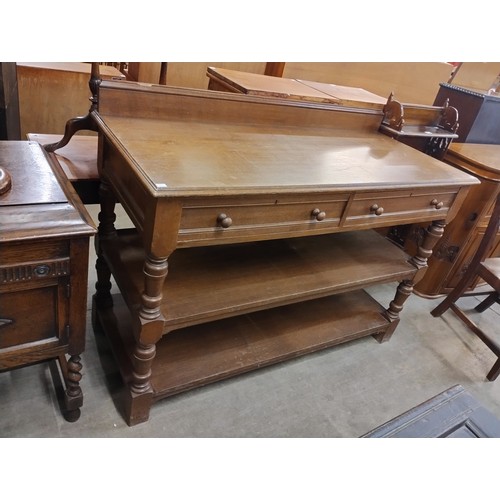 135 - A late Victorian Liberty & Co oak three tier buffet sideboard