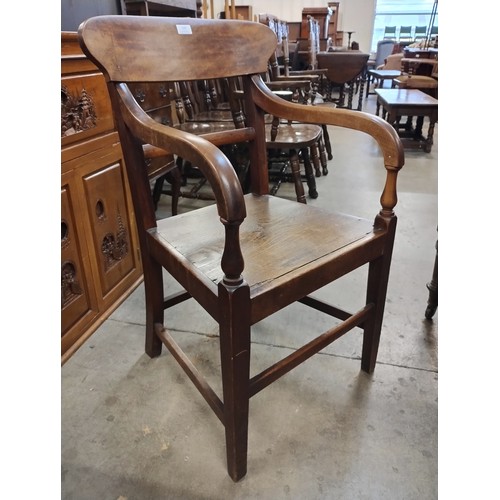 137 - A George III mahogany elbow chair