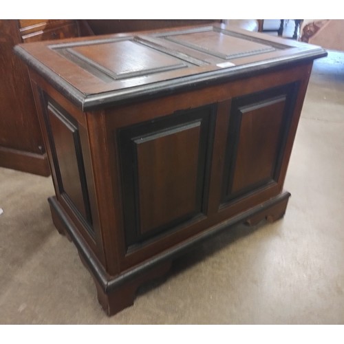 146 - A mahogany panelled blanket box