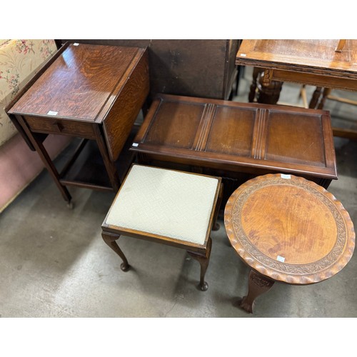 236 - An oak trolley, a blanket box, a Queen Anne style piano stool and a circular occasional table