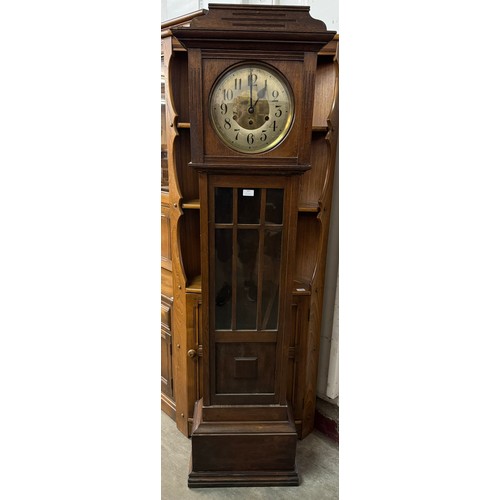 257 - An early 20th Century oak longcase clock