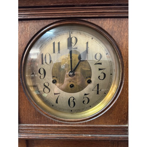 257 - An early 20th Century oak longcase clock