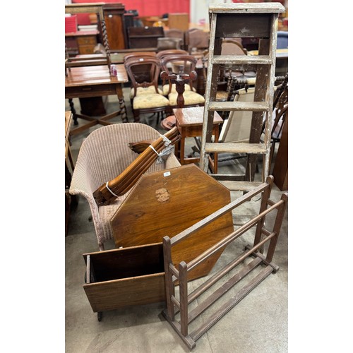 238 - An Edward VII walnut occasional table, a shoe rack, oak magazine rack, etc.