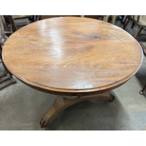 239 - A Victorian mahogany circular tilt top breakfast table