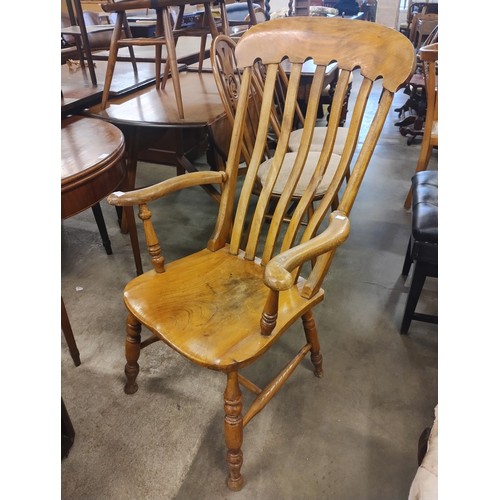 200 - A Victorian elm farmhouse armchair