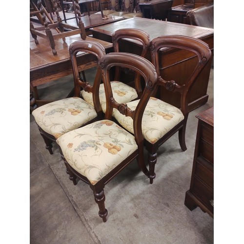 202 - A set of four Victorian mahogany balloon back chairs