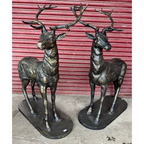 261 - A pair of large cast iron figures of stags