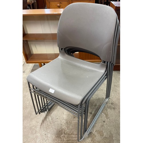 59 - A set of six Herman Miller grey plastic & tubular metal Limerick stacking chairs