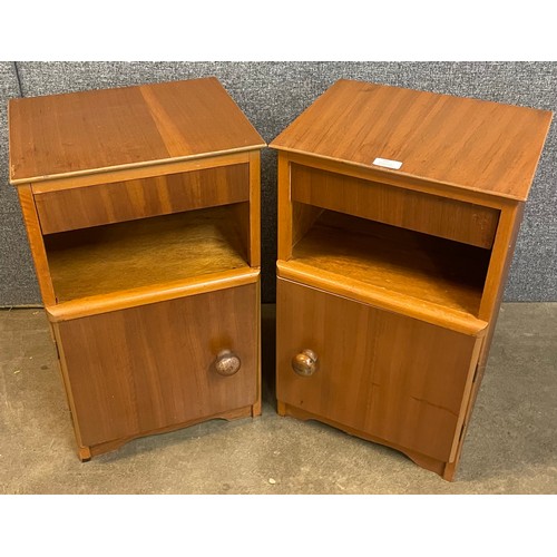 60 - A pair of teak bedside cabinets