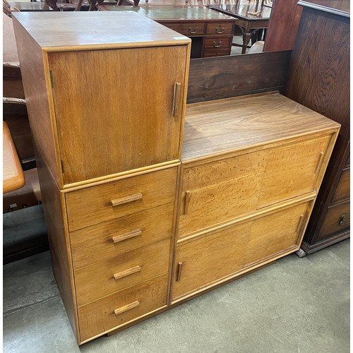 64 - A light oak and walnut effect side cabinet