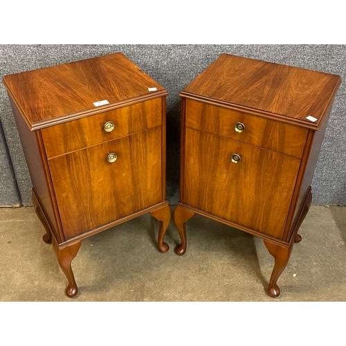 75 - A pair of Queen Anne style figured walnut pot cupboards