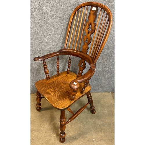 77 - A 19th Century style elm and yew Windsor chair