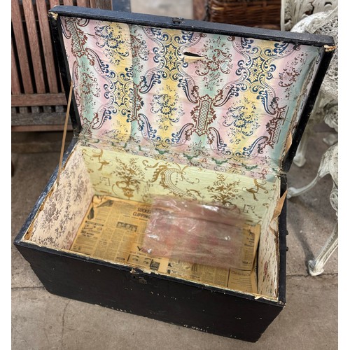 279 - An early 20th Century black domed topped steamer trunk