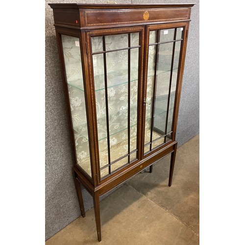 94 - An Edward VII inlaid mahogany display cabinet