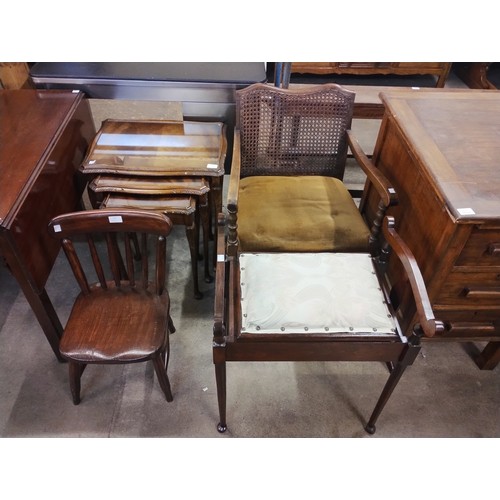 225 - A mahogany piano stool, a nest of tables, a child's chair and a bergere armchair