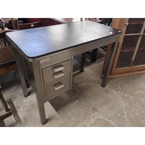 234 - A Strong Steel three drawer metal desk