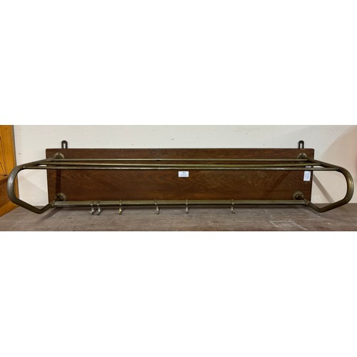 301 - An early 20th Century oak mounted railway luggage rack