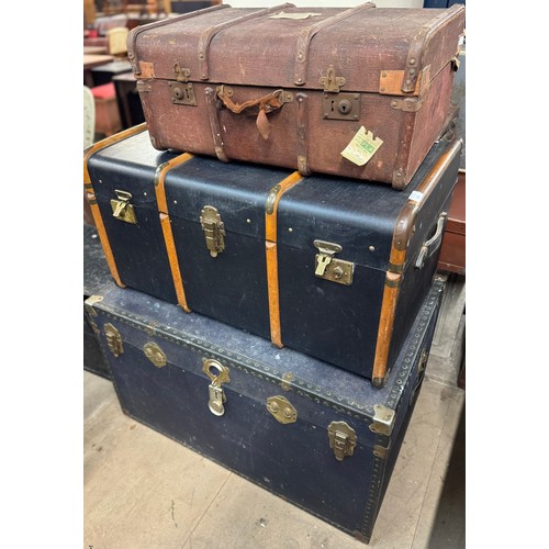 282 - Two vintage steamer trunks and a suitcase