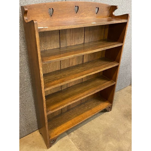 95 - An Arts and Crafts Liberty & Co. oak open bookcase