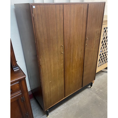 56A - A G-Plan Librenza tola wood three door wardrobe