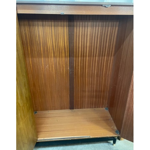 56A - A G-Plan Librenza tola wood three door wardrobe