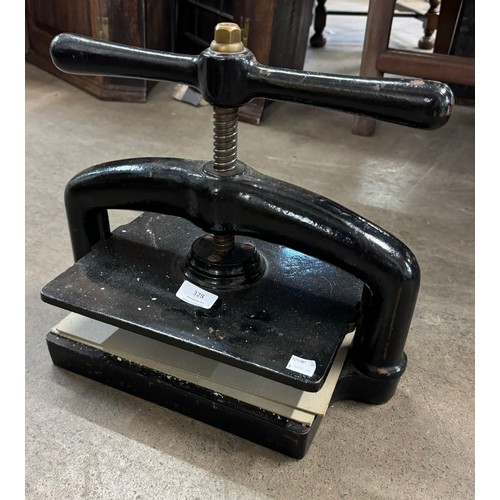 328 - A Victorian cast iron book press