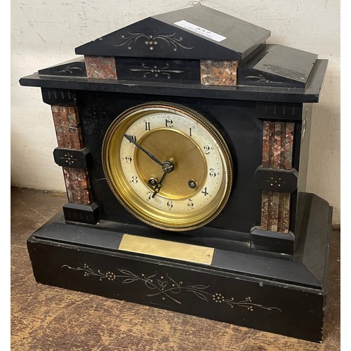 337 - A 19th Century French Belge noir mantle clock