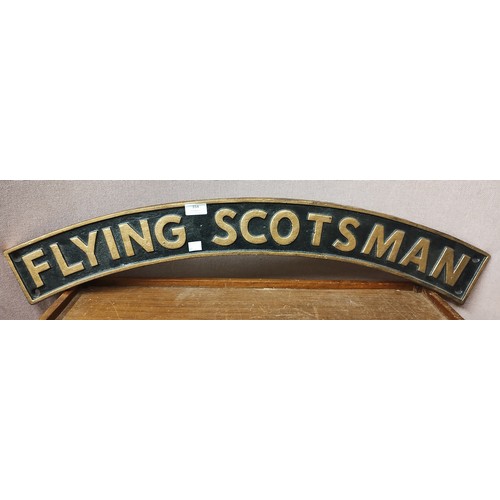 354 - A reproduction cast iron Flying Scotsman plaque