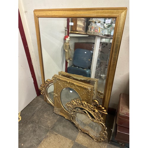 345 - Six gilt framed mirrors